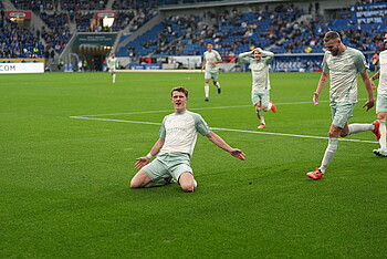 Jens Stage does a knee slide after scoring for the third time against Hoffenheim