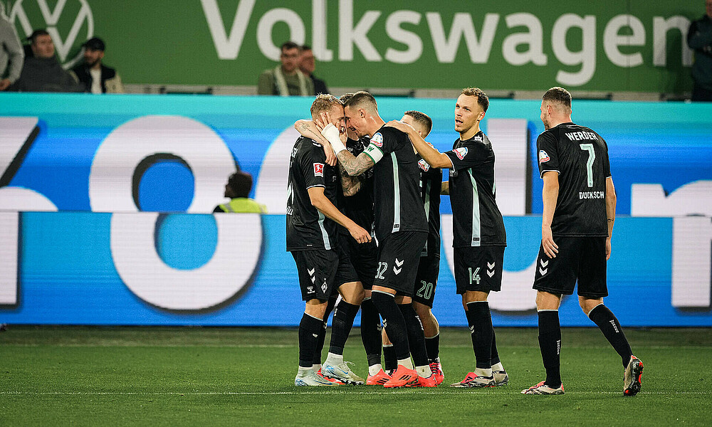 Marco Grüll celebrates with his teammates.