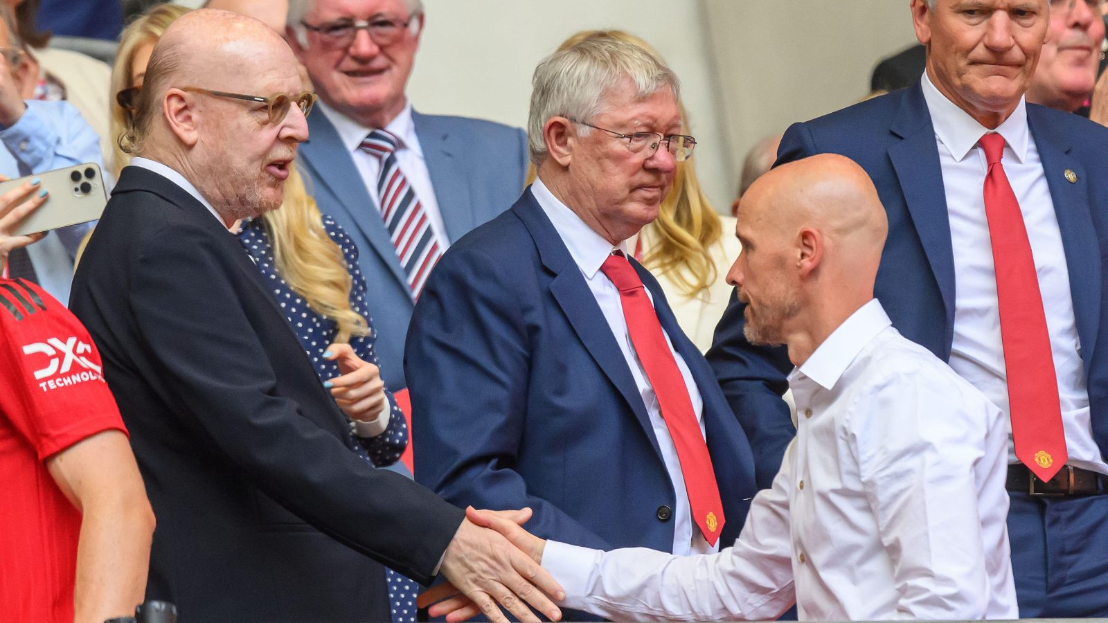 Man Utd owner Avram Glazer shakes Erik ten Hag's hand