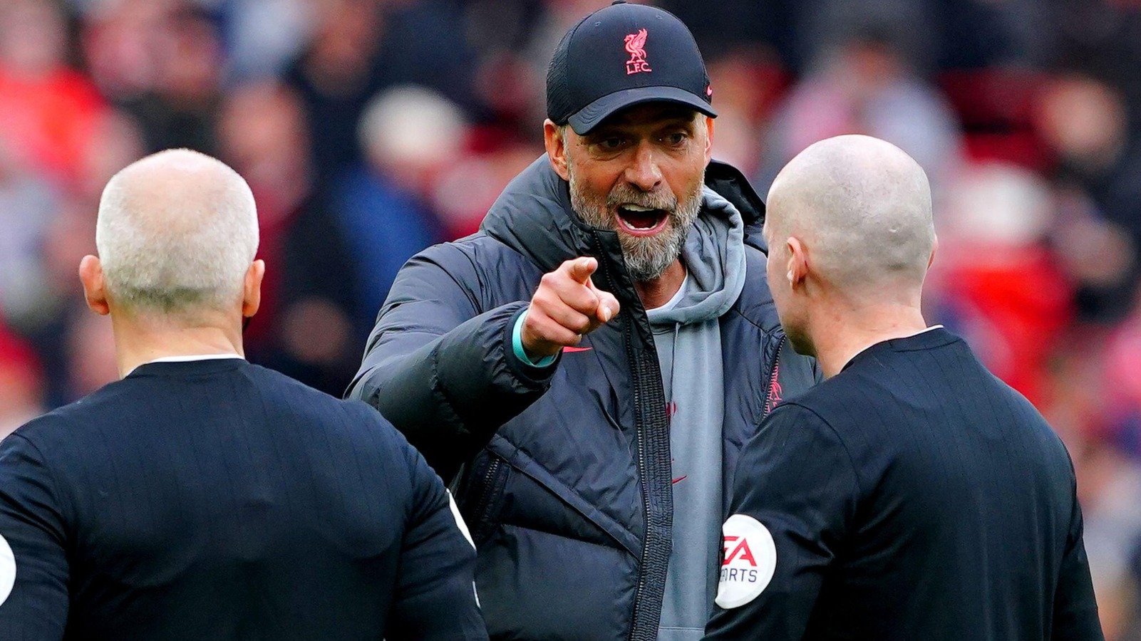 Jurgen Klopp argues with referee Paul Tierney after Liverpool's win over Tottenham.